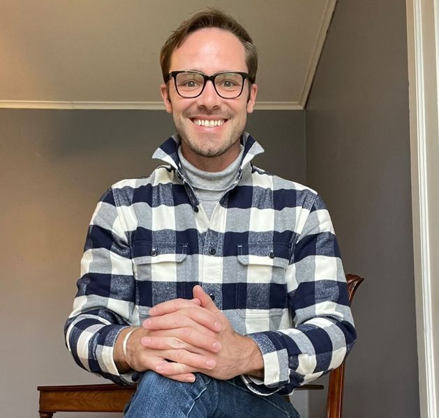 Andrew Fitch smiles for a photo